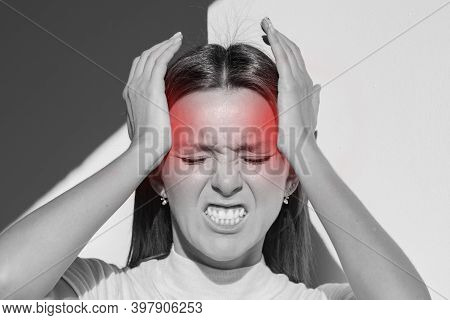 Young Woman Touching Her Temples And Having Strong Tension Headache. Cluster Headache. Female Suffer