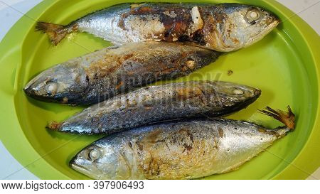 Pindang Fish After Frying Is Served On A Green Plate. Close Up, Focus Selected