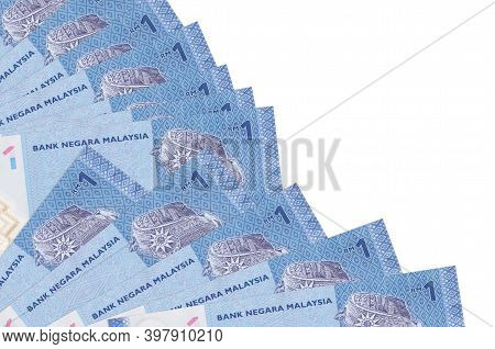 1 Malaysian Ringgit Bills Lies Isolated On White Background With Copy Space Stacked In Fan Close Up