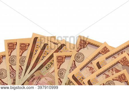 10 Nepalese Rupees Bills Lies On Bottom Side Of Screen Isolated On White Background With Copy Space.