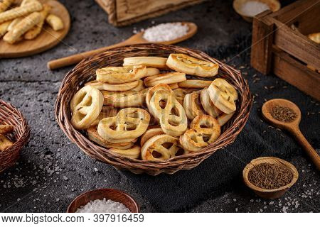 Homemade Whole Meal Pretzels With Cummin Seed In Little Wicker Basket