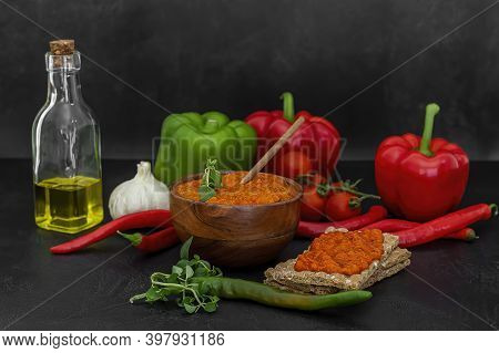 Roasted Red Pepper Relish Ajvar Or Aivar. Traditional Balkan Vegetable Caviar With Green And Red Bel