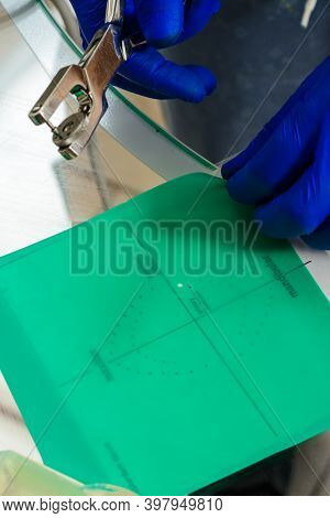 Rozhnyativ, Ukraine September 15, 2020: A Dentist Uses A Rubber Dam For Sterile Work And Dental Trea