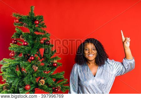 Afro Spanish Woman Celebration Christmas In Silver Dress