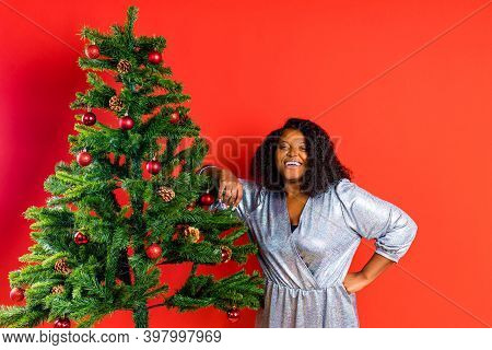 Afro Spanish Woman Celebration Christmas In Silver Dress