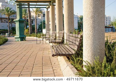 Outdoor patio of columns and benches
