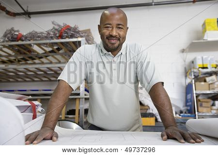 Workman Reading a Blueprint