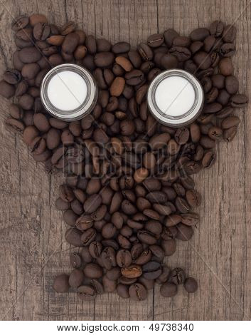 owl made of coffee beans, coffee with milk for sleepless nights