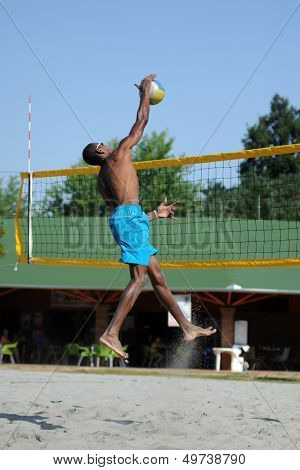 KAPOSVAR, HUNGARY - AUGUST 4: Leonel Munder in action at a ROAK Viragfurdo Kupa beach volleyball competition, August 4, 2013 in Kaposvar, Hungary.