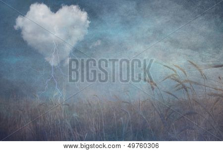Heart cloud over field grunge textured