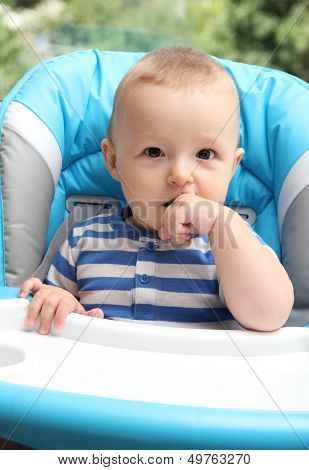 Baby Sitting In Highchair