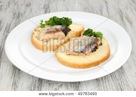 Tasty sandwiches with scomber, close-up