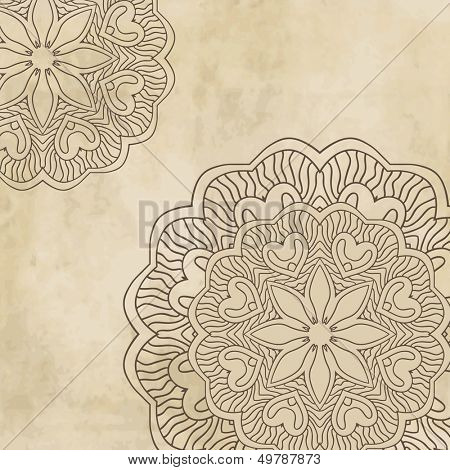Sfondo vintage con ornamento mandala su carta grunge