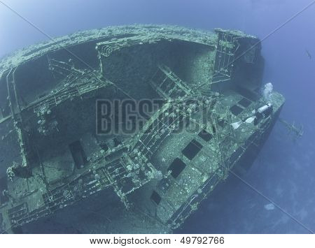 Scuba Diver Exploring A Shipwreck