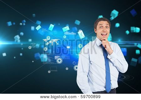 Thinking businessman touching his chin against futuristic screen with quaders