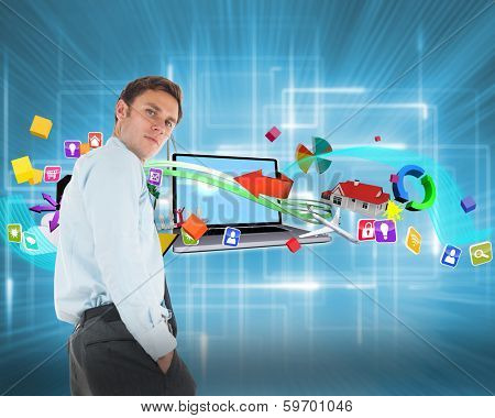 Serious businessman standing with hands in pockets against multiple geometric lights