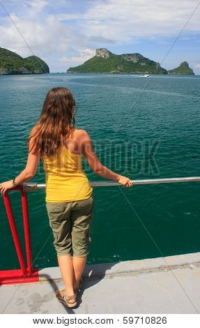 Young Woman Admiring Scene From A Boat, Ang Thong National Marine Park , Thailand