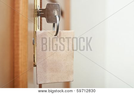 key in keyhole with blank label 