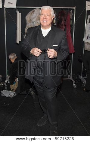 NEW YORK-FEB 10: Designer Dennis Basso poses backstage before the Dennis Basso fashion show during Mercedes-Benz Fashion Week Fall 2014 at Lincoln Center on February 10, 2014 in New York City. 