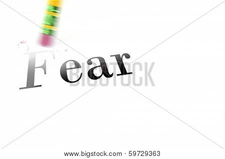 Person using a pencil eraser to erase fear from their life so they can start new
