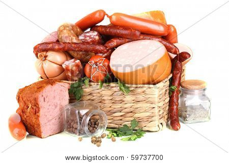Lot of different sausages in basket isolated on white