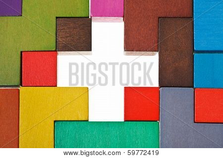 Above View Of Cross Shape Hole In Puzzle