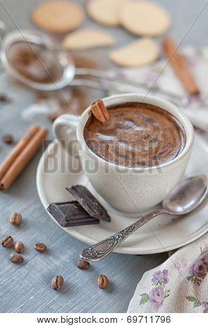 Cup Of Coffee With Cinnamon And Chocolate
