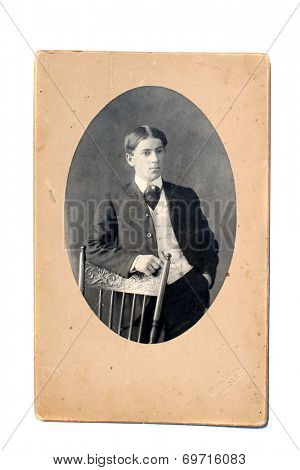 USA- CIRCA 1900s: An antique photo shows studio portrait of a young man. 
