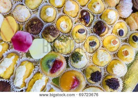 Various Stuffed Puffs With Cream Decorated