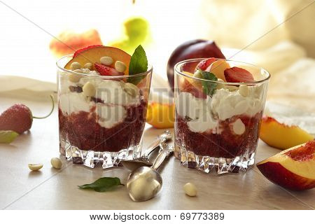 Dessert with whipped cream and fruit
