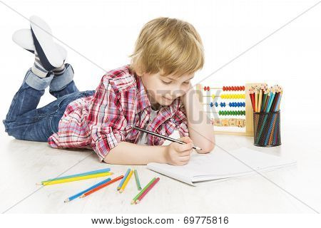 School Boy Writing Exercise In Notebook. Schoolboy Do A Sum Of Mathematics Homework, Isolated On Whi