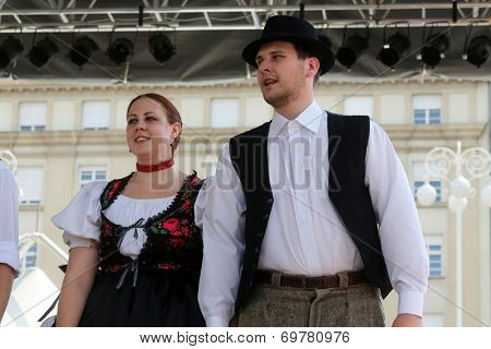 ZAGREB, CROATIA - JULY 19: Members of folk groups Nograd  from Salgotarjan, Hungary during the 48th International Folklore Festival in center of Zagreb, Croatia on July 19, 2014