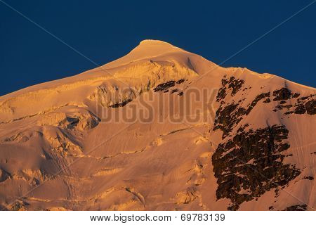main Caucasian ridge at sunset.Tetnuld and Gestola peaks,Georgia