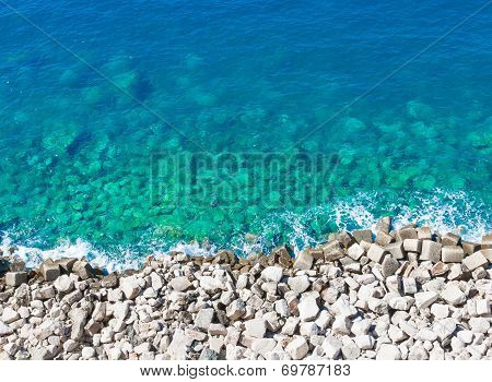 Top Of View Limpid Water On Gravel Beach