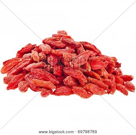 Heap pile of Goji berries. The addition to the tea beverage  isolated on white background