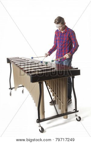 Teenage Boy Playing Marimba In Studio