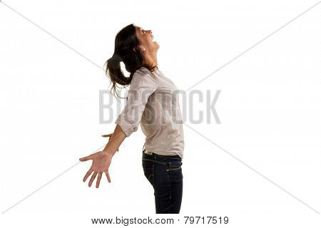 a young woman takes a deep breath and enjoy life