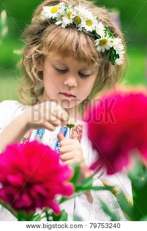 Child In Flowers