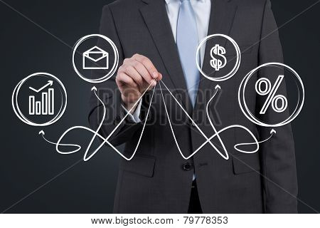 Businessman Holding Business Symbols