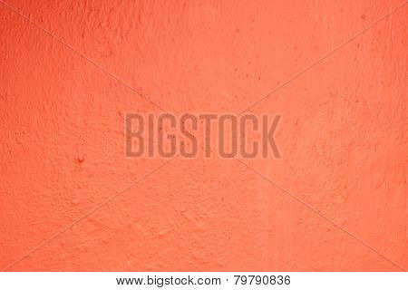 Freshly painted uneven red wall surface texture