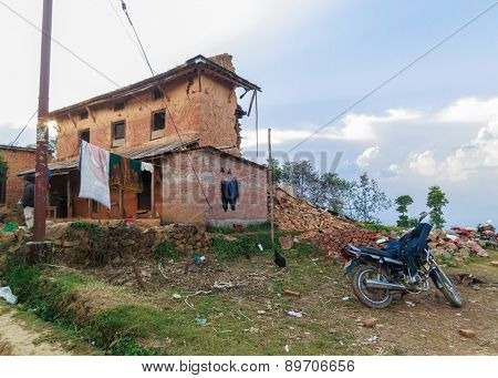 KOT DANDA, LALITPUR, NEPAL - MAY 2, 2015: Damaged house after the 7.8 earthquake that hit Nepal on April 25, 2015.
