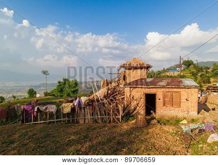 KOT DANDA, LALITPUR, NEPAL - MAY 2, 2015: Damaged house after the 7.8 earthquake that hit Nepal on April 25, 2015.
