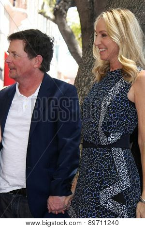 LOS ANGELES - MAY 1:  Michael J. Fox, Tracy Pollan at the Julianna Margulies Hollywood Walk of Fame Star Ceremony at the Hollywood Boulevard on May 1, 2015 in Los Angeles, CA
