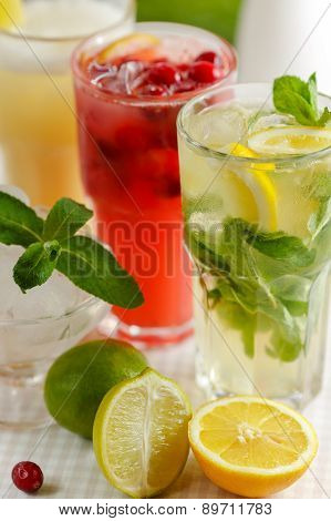 Three glasses of refreshing drink Mohito