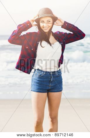 Portrtait of a happy girl enjoying the day on the beach