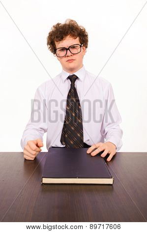 business man sitting at table and reading book isolated on white