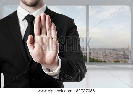 Businessman In Office Hand Stop Gesture
