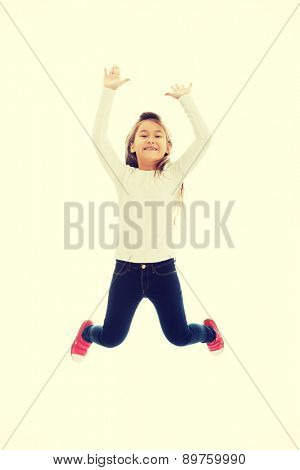 Little pretty girl jumping with joy