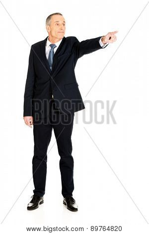 Full length boss dismissing someone.