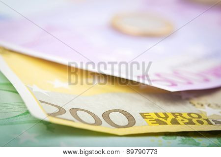 Closeup Of Euro Banknotes And Coins